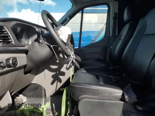 2024 Ford Transit Cargo with VIN 1FTRU8XG8RKA15196, listed as a Copart auction lot 84198984 with 12,267 mi miles and Salvage Title. Bid and sale history available at DreamBid. Image 7.