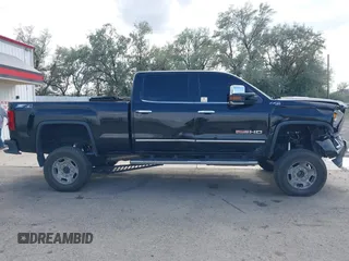 2015 GMC Sierra 2500HD SLT with VIN 1GT12ZE87FF552599, listed as a IAAI auction lot 40054977 with 146,190 mi miles and . Bid and sale history available at DreamBid. Image 12.
