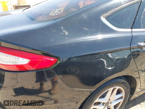 2016 Ford Fusion SE with VIN 3FA6P0HD3GR333466, listed as a IAAI auction lot 42034240 with 184,577 mi miles. Bid and sale history available at carsss.com. Image 6.