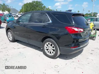 2020 Chevrolet Equinox LT z VIN 2GNAXKEV2L6234577, wystawiony jako IAAI lot #42186081 z przebiegiem 99 795 mil mil oraz . Historia ofert i sprzedaży dostępna na DreamBid. Obrazek 3.