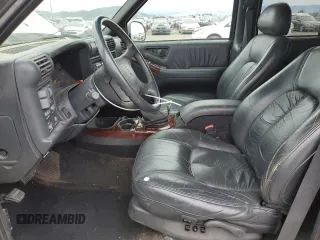 1997 Oldsmobile Bravada z VIN 1GHDT13W7V2711487, wystawiony jako Copart lot #57820455 z przebiegiem 182 784 mil mil oraz Tytuł czysty. Historia ofert i sprzedaży dostępna na DreamBid. Obrazek 7.