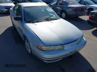 2004 Oldsmobile Alero GL1 z VIN 1G3NL52E54C196878, wystawiony jako IAAI lot #42357662 z przebiegiem Nie podano mil oraz . Historia ofert i sprzedaży dostępna na DreamBid. Obrazek 6.