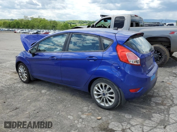 2014 Ford Fiesta SE z VIN 3FADP4EJ3EM168232, wystawiony jako Copart lot #55940485 z przebiegiem 111 563 mil mil oraz Szkoda całkowita • Salvage title. Historia ofert i sprzedaży dostępna na DreamBid. Obrazek 2.