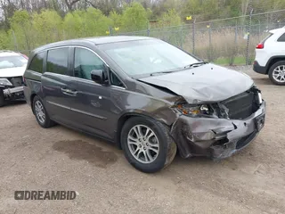 2011 Honda Odyssey EX-L with VIN 5FNRL5H68BB100274, listed as a IAAI auction lot 42159787 with 205,616 mi miles and . Bid and sale history available at carsss.com. Image 1.