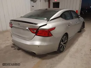 2017 Nissan Maxima SR with VIN 1N4AA6AP0HC448285, listed as a IAAI auction lot 41397027 with 91,557 mi miles. Bid and sale history available at carsss.com. Image 4.