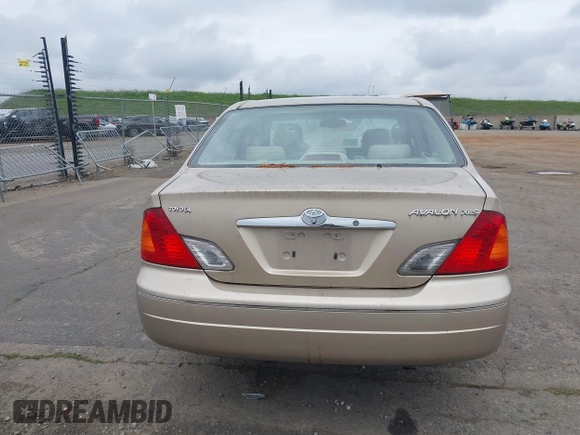 2001 Toyota Avalon XL w/Bucket Seats with VIN 4T1BF28B91U173868, listed as a IAAI auction lot 41721904 with 325,097 mi miles. Bid and sale history available at carsss.com. Image 16.