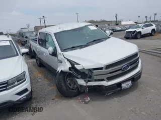 2019 Ford F-150 XL with VIN 1FTEW1C49KFC11657, listed as a IAAI auction lot 42170750 with 91,897 mi miles and . Bid and sale history available at DreamBid. Image 1.