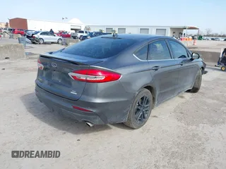 2020 Ford Fusion SE with VIN 3FA6P0HD7LR169021, listed as a IAAI auction lot 41575796 with 77,824 mi miles. Bid and sale history available at carsss.com. Image 4.