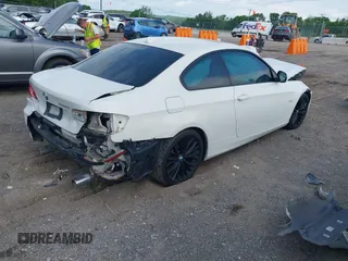 2011 BMW 3 Series 335i with VIN WBAKG7C56BE598702, listed as a IAAI auction lot 42159394 with Not provided miles and . Bid and sale history available at DreamBid. Image 4.