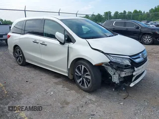 2019 Honda Odyssey Elite z VIN 5FNRL6H95KB047758, wystawiony jako IAAI lot #42254251 z przebiegiem 93 629 mil mil oraz . Historia ofert i sprzedaży dostępna na DreamBid. Obrazek 1.