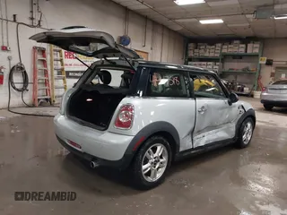 2013 MINI Hardtop with VIN WMWSU3C51DT374317, listed as a IAAI auction lot 41447518 with 142,943 mi miles and . Bid and sale history available at DreamBid. Image 4.