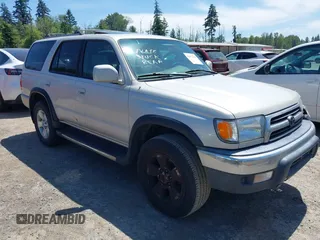 2000 Toyota 4Runner SR5 z VIN JT3HN86R3Y0323080, wystawiony jako IAAI lot #42471189 z przebiegiem 213 650 mil mil oraz . Historia ofert i sprzedaży dostępna na DreamBid. Obrazek 1.