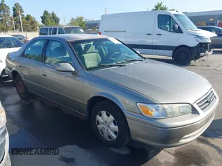 2000 Toyota Camry CE with VIN 4T1BG22K3YU004252, listed as a IAAI auction lot 42130158 with 236,104 mi miles. Bid and sale history available at carsss.com. Image 1.