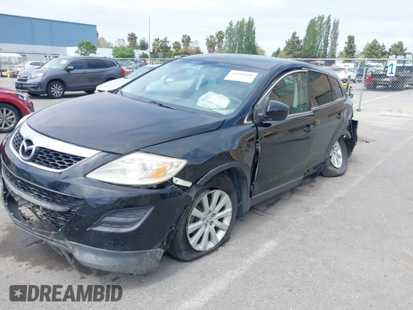 2010 Mazda CX-9 Grand Touring with VIN JM3TB2MV1A0203416, listed as a IAAI auction lot 42090500 with 131,659 mi miles and . Bid and sale history available at carsss.com. Image 6.