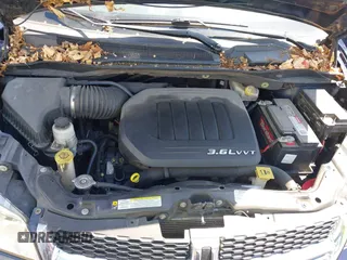 2012 Dodge Grand Caravan SXT with VIN 2C4RDGCGXCR277505, listed as a IAAI auction lot 42194492 with 206,565 mi miles and . Bid and sale history available at DreamBid. Image 10.