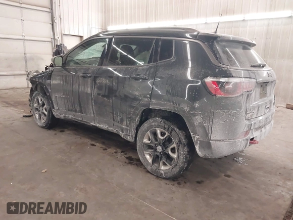 2018 Jeep Compass Trailhawk with VIN 3C4NJDDB2JT211775, listed as a IAAI auction lot 41610112 with 99,238 mi miles and . Bid and sale history available at DreamBid. Image 3.