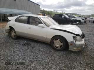 1999 Lexus LS 400 z VIN JT8BH28F3X0157116, wystawiony jako Copart lot #54922395 z przebiegiem 355 269 mil mil oraz Szkoda całkowita • Salvage title. Historia ofert i sprzedaży dostępna na DreamBid. Obrazek 4.