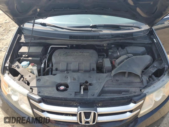 2014 Honda Odyssey Touring with VIN 5FNRL5H91EB015162, listed as a Copart auction lot 60643135 with 176,898 mi miles and Salvage title. Bid and sale history available at DreamBid. Image 12.