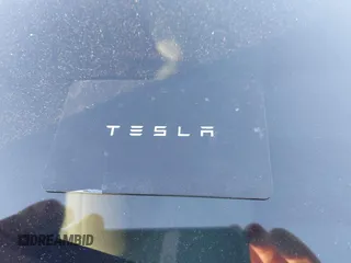 2023 Tesla Model 3 with VIN 5YJ3E1EAXPF486639, listed as a IAAI auction lot 41387797 with 18,603 mi miles and . Bid and sale history available at carsss.com. Image 11.
