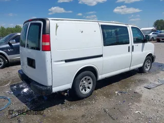 2012 Chevrolet Express Cargo Van with VIN 1GCSGAFX5C1145743, listed as a IAAI auction lot 42027282 with 202,770 mi miles. Bid and sale history available at carsss.com. Image 4.