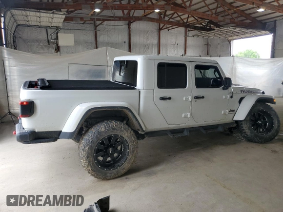 2020 Jeep Gladiator Rubicon z VIN 1C6JJTBG4LL102523, wystawiony jako Copart lot #54735955 z przebiegiem 104 579 mil mil oraz Szkoda całkowita • Salvage title. Historia ofert i sprzedaży dostępna na DreamBid. Obrazek 3.