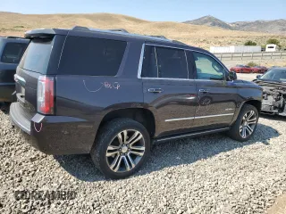 2018 GMC Yukon Denali with VIN 1GKS2CKJXJR217857, listed as a Copart auction lot 62943934 with 122,015 mi miles and Salvage Title. Bid and sale history available at carsss.com. Image 3.