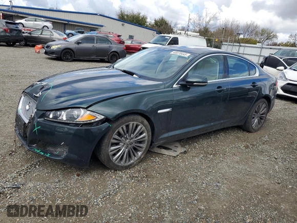 2012 Jaguar XF Portfolio with VIN SAJWA0HB4CLS49225, listed as a Copart auction lot 48070445 with 61,059 mi miles and Salvage Title. Bid and sale history available at carsss.com. Image 1.