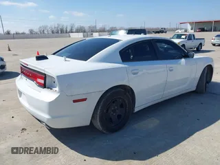 2012 Dodge Charger Police with VIN 2C3CDXAT6CH305817, listed as a IAAI auction lot 41608673 with 173,761 mi miles. Bid and sale history available at carsss.com. Image 4.