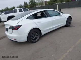 2019 Tesla Model 3 Long Range with VIN 5YJ3E1EB2KF361541, listed as a IAAI auction lot 41859373 with 54,664 mi miles. Bid and sale history available at carsss.com. Image 4.