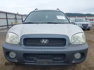 2003 Hyundai Santa Fe GLS z VIN KM8SC73DX3U357525, wystawiony jako IAAI lot #42436777 z przebiegiem 228 844 mil mil oraz . Historia ofert i sprzedaży dostępna na DreamBid. Obrazek 6.