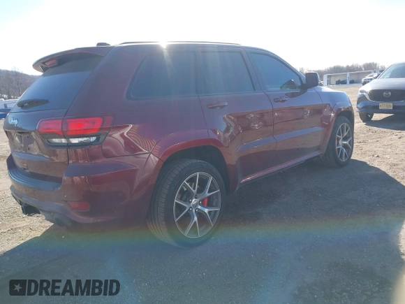 2017 Jeep Grand Cherokee SRT with VIN 1C4RJFDJ1HC754559, listed as a IAAI auction lot 41461029 with 100,096 mi miles. Bid and sale history available at carsss.com. Image 4.