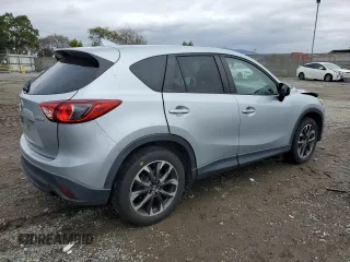 2016 Mazda CX-5 Grand Touring with VIN JM3KE2DY2G0894056, listed as a Copart auction lot 49247815 with 56,039 mi miles and Salvage Title. Bid and sale history available at carsss.com. Image 3.