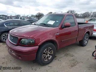 2003 Ford F-150 Heritage XL with VIN 2FTRF17243CA98658, listed as a IAAI auction lot 41300715 with 221,146 mi miles. Bid and sale history available at carsss.com. Image 18.