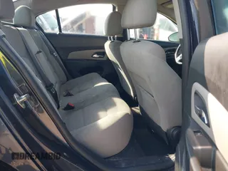 2014 Chevrolet Cruze 1LT z VIN 1G1PC5SB5E7245983, wystawiony jako IAAI lot #42552033 z przebiegiem 168 310 mil mil oraz . Historia ofert i sprzedaży dostępna na DreamBid. Obrazek 8.