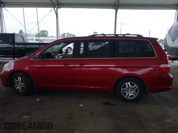 2005 Honda Odyssey EX with VIN 5FNRL38485B411954, listed as a IAAI auction lot 42039034 with 220,966 mi miles. Bid and sale history available at carsss.com. Image 14.