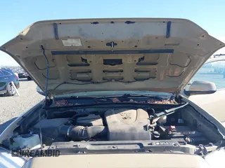 2018 Toyota Tacoma SR z VIN 3TMCZ5AN7JM125425, wystawiony jako IAAI lot #40459066 z przebiegiem 85 182 mil mil oraz . Historia ofert i sprzedaży dostępna na DreamBid. Obrazek 10.