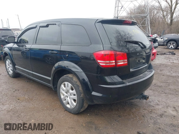 2014 Dodge Journey SE with VIN 3C4PDCAB8ET151666, listed as a IAAI auction lot 41721164 with 262,991 mi miles and . Bid and sale history available at carsss.com. Image 3.