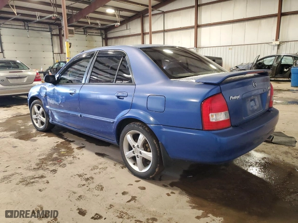 2003 Mazda Protege DX with VIN JM1BJ225631148128, listed as a Copart auction lot 44385925 with 196,871 mi miles and Salvage Title. Bid and sale history available at carsss.com. Image 2.