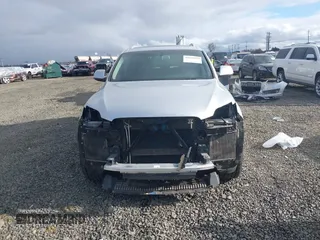 2014 Audi Q7 3.0T Premium Plus with VIN WA1LGAFE0ED015237, listed as a IAAI auction lot 41671129 with 114,410 mi miles. Bid and sale history available at carsss.com. Image 13.