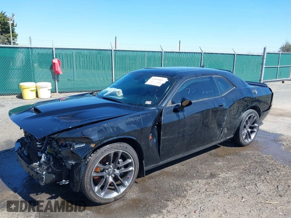 2022 Dodge Challenger R/T Scat Pack z VIN 2C3CDZFJ4NH256848, wystawiony jako IAAI lot #41850081 z przebiegiem 23 537 mil mil oraz . Historia ofert i sprzedaży dostępna na DreamBid. Obrazek 19.