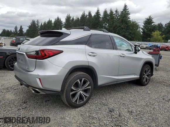 2016 Lexus RX 350 with VIN JTJBZMCA5G2005796, listed as a Copart auction lot 64453905 with 69,784 mi miles and Salvage title. Bid and sale history available at DreamBid. Image 3.