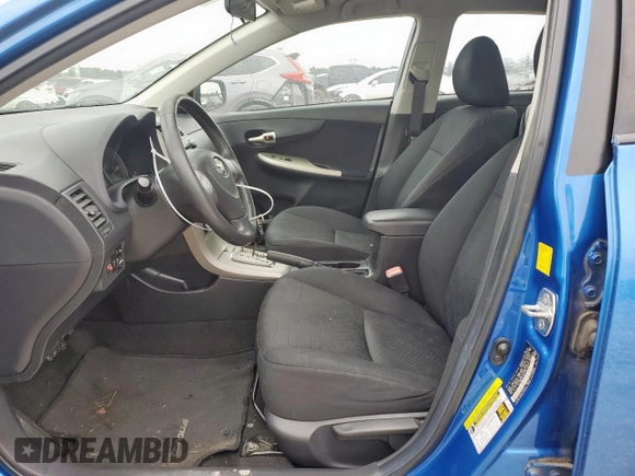 2010 Toyota Corolla with VIN 2T1BU4EE5AC498504, listed as a Copart auction lot 57043515 with 128,651 mi miles and Salvage title. Bid and sale history available at DreamBid. Image 7.