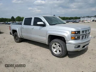 2015 Chevrolet Silverado 1500 LT with VIN 3GCUKREC9FG147988, listed as a Copart auction lot 53784635 with 218,260 mi miles and Salvage Title. Bid and sale history available at DreamBid. Image 4.