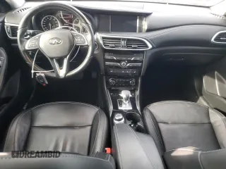 2018 Infiniti QX30 Premium with VIN SJKCH5CR7JA061030, listed as a Copart auction lot 86605824 with 94,717 mi miles and Clean title. Bid and sale history available at DreamBid. Image 8.