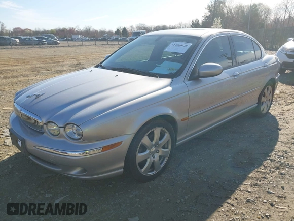 2004 Jaguar X-Type with VIN SAJEA51C94WD62540, listed as a IAAI auction lot 41864020 with 85,713 mi miles. Bid and sale history available at carsss.com. Image 2.