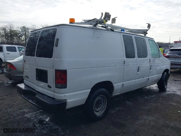 2011 Ford Econoline Cargo Van Commercial with VIN 1FTNE2EL6BDA76582, listed as a IAAI auction lot 41088478 with 105,002 mi miles. Bid and sale history available at carsss.com. Image 4.