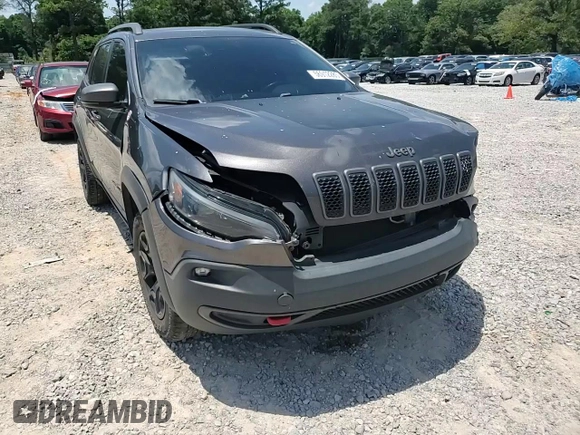 2019 Jeep Cherokee Trailhawk с VIN 1C4PJMBX5KD278692, выставлен на аукционе Copart как лот 56912285 с пробегом 110 964 миль миль и Списание • Salvage title. История ставок и продаж доступна на DreamBid. Изображение 14.