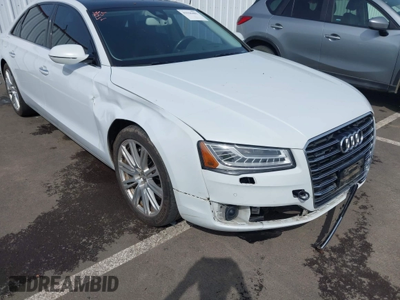 2015 Audi A8 4.0T with VIN WAU32AFD6FN039739, listed as a IAAI auction lot 41946401 with 102,668 mi miles and . Bid and sale history available at DreamBid. Image 6.