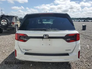 2025 Honda Odyssey Touring with VIN 5FNRL6H87SB001792, listed as a Copart auction lot 51049255 with Not provided miles and Salvage title. Bid and sale history available at DreamBid. Image 6.