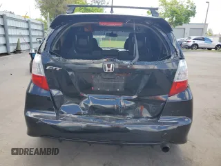 2013 Honda Fit Sport z VIN JHMGE8H5XDC074950, wystawiony jako Copart lot #57762905 z przebiegiem 68 185 mil mil oraz Szkody całkowita. Historia ofert i sprzedaży dostępna na DreamBid. Obrazek 6.